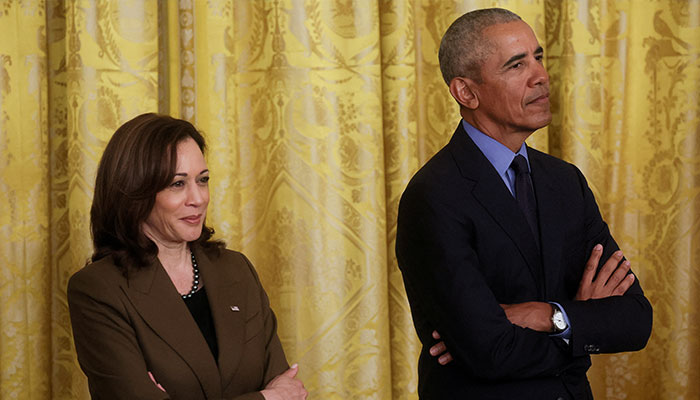 US Vice President Kamala Harris stands with former President Barack Obama during an event hosted by President Joe Biden on the Affordable Care Act in the East Room at the White House in Washington. — Reuters