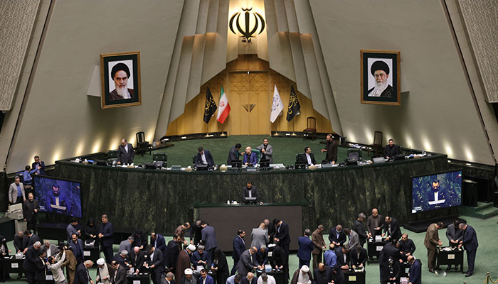 Members of the Iranian Parliament participate in a vote of trust for the cabinet of President Masoud Pezeshkian at the parliament in Tehran, Iran, August 21, 2024. — Reuters