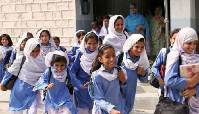 School children seen coming out of a government school in Pakistan. — AFP/File