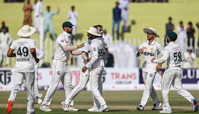 Pakistans players celebrate after the dismissal of Bangladeshs Shadman Islam during the third day of the first Test cricket match between Pakistan and Bangladesh at the Rawalpindi Cricket Stadium in Rawalpindi on August 23, 2024. — AFP