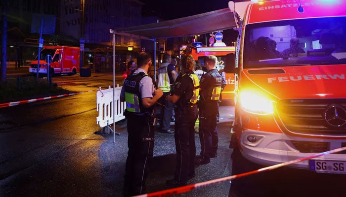 Police officers secure the area of an incident, after several individuals were killed when a man stabbed passers-by with a knife, at a city festival in Solingen, Germany on August 23, 2024. — Reuters