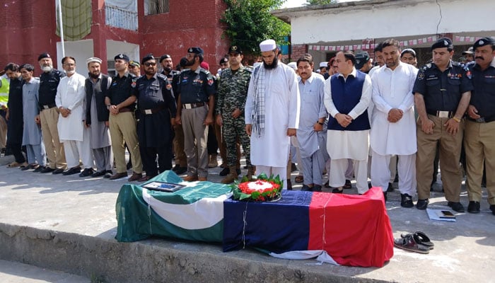 Police officials offer funeral prayer of policeman martyred in attack on checkpost on August 25, 2024. — Photo by reporter