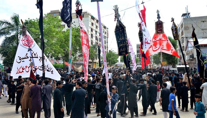 A large numbers of Mourners attending Ashura procession on 9th Muharramul Haram at Latifabad, Hyderabad on July 28, 2023. — APP