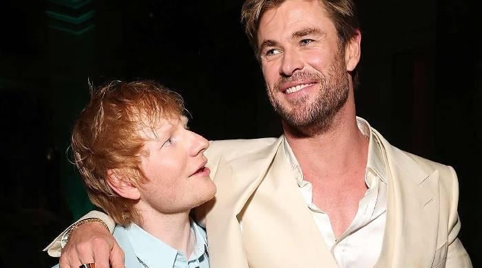 Chris Hemsworth learns drums for a surprise Ed Sheeran duet