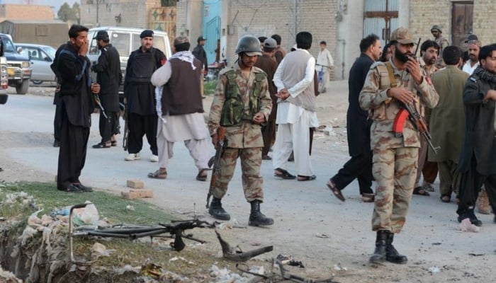 Personnel of paramilitary forces standing guard in an area of Balochistan. —AFP/ File