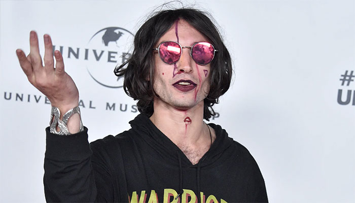 Father who accused Ezra Miller of grooming withdraws complaint.