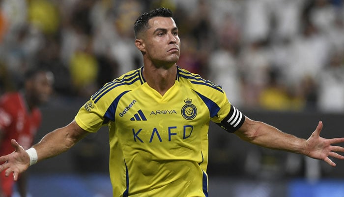 Al Nassrs Cristiano Ronaldo celebrates scoring their first goal during match against Al Raed for Saudi Pro League at Al-Awwal Stadium, Riyadh, Saudi Arabia on August 22, 2024. — Reuters