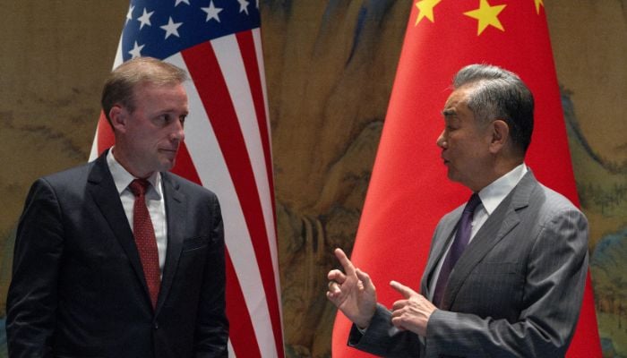 White House National Security Adviser Jake Sullivan (L) listens to Wang Yi, the director of the Communist Partys Central Foreign Affairs Commission Office before talks at Yanqi Lake in Beijing, China, August 27, 2024. — Reuters