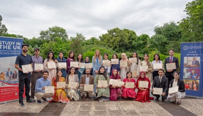 Pakistani students pictured along with British High Commissioner Jane Marriott. — APP via British High Commission