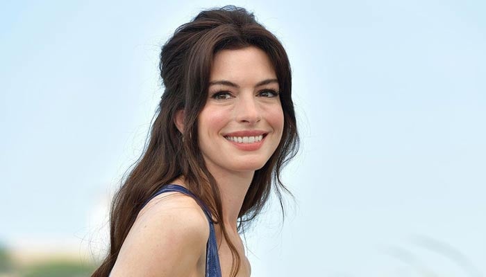 Anne Hathaway flaunts acne in style in latest post