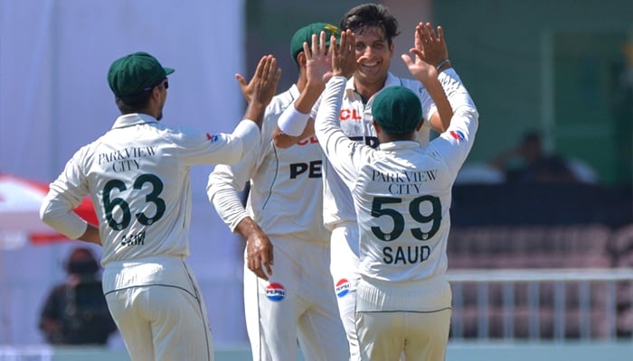 Pakistani pacer Mir Hamza celebrates wicket with teammates during day three of the second Test between Pakistan and Bangladesh at Rawalpindi Cricket Stadium on September 1, 2024. — PCB