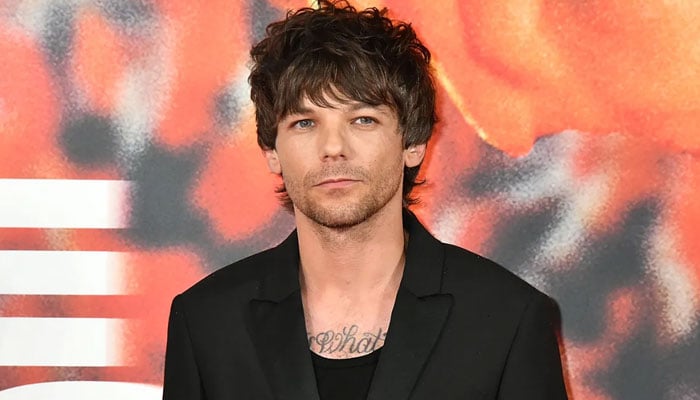 Louis Tomlinson has his fingers-crossed for Oasis tour