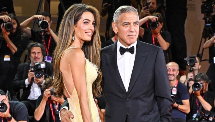 George Clooney makes rare appearance with Amal at Wolfs premiere