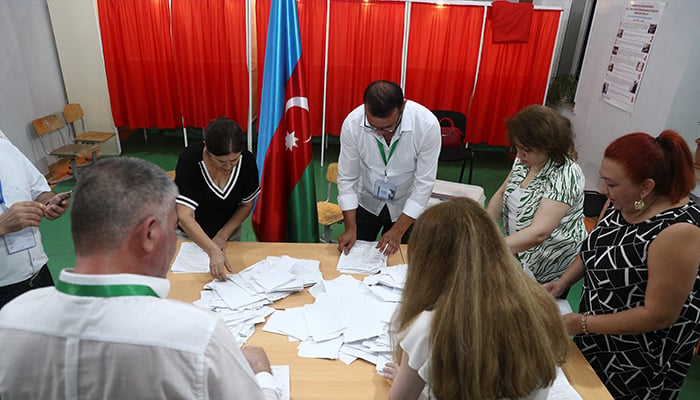 Members of an electoral commission count votes during parliamentary elections in Baku, Azerbaijan on September 1, 2024. — Reuters