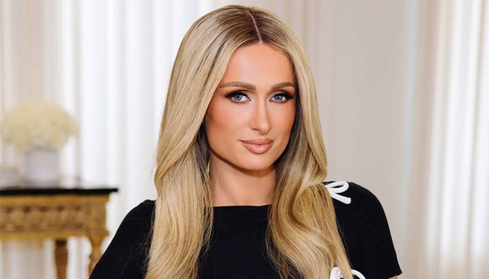 Paris Hilton is putting blood, sweat, fire and tears in her music video for Bad Bitch Academy