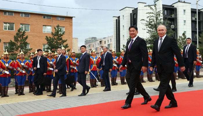 In this pool photograph distributed by the Russian state agency Sputnik, Russia’s President Vladimir Putin and Mongolia’s President Ukhnaagiin Khurelsukh attend a wreath laying ceremony at a monument to Soviet Marshal Georgy Zhukov in Ulaanbaatar on September 3, 2024. — AFP