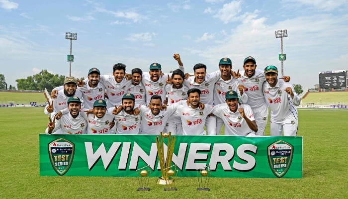 Bangladesh players celebrate with trophy after winning the second Test match against Pakistan at the Rawalpindi Cricket Stadium in Rawalpindi on September 3, 2024. —AFP