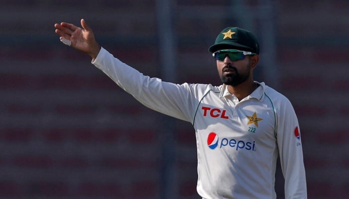 Former captain Babar Azam gestures during a Test match between Pakistan and England at the National Stadium Karachi on December 18, 2022. REUTERS