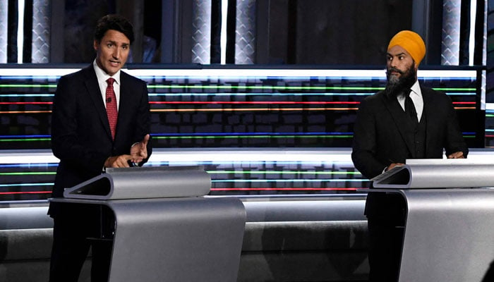 Canadian Prime Minister and Liberal Leader Justin Trudeau (left) and NDP Leader Jagmeet Singh participate in the federal election English-language Leaders debate in Gatineau, Quebec, Canada on September 9, 2021. — AFP