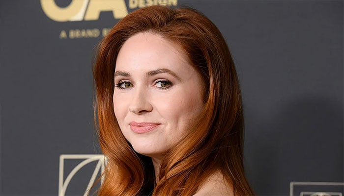 Karen Gillan announces pregnancy at The Life of Chuck premiere with husband Nick Kocher.