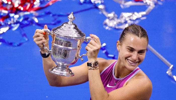 Belarus’s Aryna Sabalenka holds up the trophy after defeating USA’s Jessica Pegula during their women’s final match on day thirteen of the US Open tennis tournament at the USTA Billie Jean King National Tennis Center in New York City, on September 7, 2024. — AFP