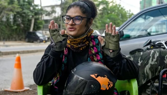 Amina Sohail, motorcycle rider in Karachi. —AFP/ File