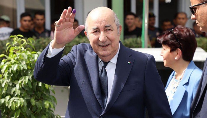 A handout picture released by the Algerian Presidency Facebook page, shows Algeria´s incumbent President Abdelmadjid Tebboune leaving a polling station after voting in Algiers on September 7, 2024.— AFP/file