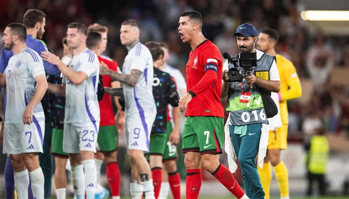 Cristiano Ronaldo celebrates victory at the end of the UEFA Nations League football match, group A, between Portugal and Scotlandat Luz stadium in Lisbon on September 8, 2024. — AFP