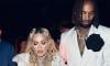 Madonna stuns in sheer top with boyfriend Akeem at Off White Party