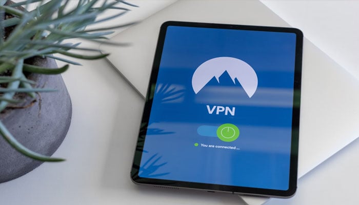 An image depicting a VPN display on the screen of a tablet kept on a table. — Unsplash/File