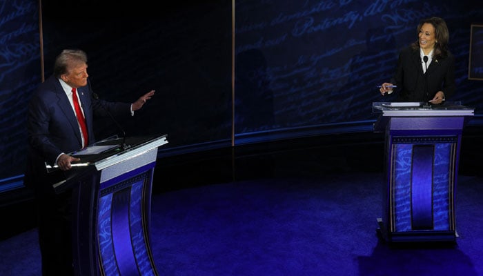 Republican presidential nominee, former US President Donald Trump and Democratic presidential nominee, US Vice President Kamala Harris both speak as they attend a presidential debate hosted by ABC in Philadelphia, Pennsylvania, US, September 10, 2024. — Reuters