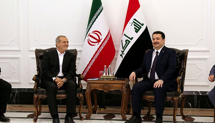 Iranian President Masoud Pezeshkian (L) meets Iraqi Prime Minister Mohammed Shia al-Sudani in Baghdad, Iraq on September 11, 2024. — Reuters