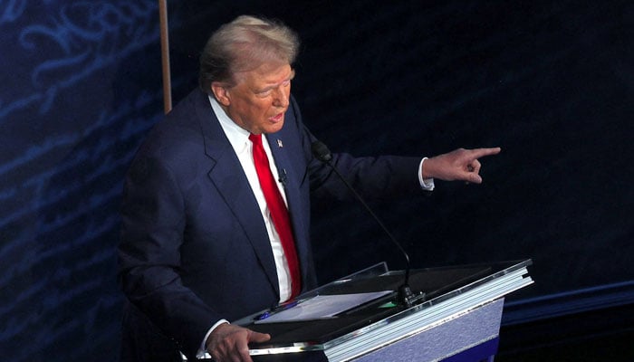 Republican presidential nominee, former US President Donald Trump points towards Democratic presidential nominee, US Vice President Kamala Harris,during a presidential debate hosted by ABC in Philadelphia, Pennsylvania, US, September 10, 2024. — Reuters