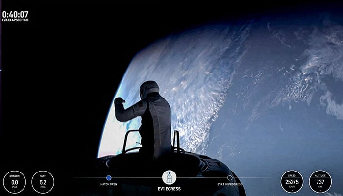 This still image taken from a SpaceX and Polaris broadcast on September 12, 2024, shows US fintech billionaire Jared Isaacman (EV1) peeking out to space from a hatch structure called Skywalker, during the first private spacewalk performed by the crew of the SpaceX Polaris Dawn mission. — AFP