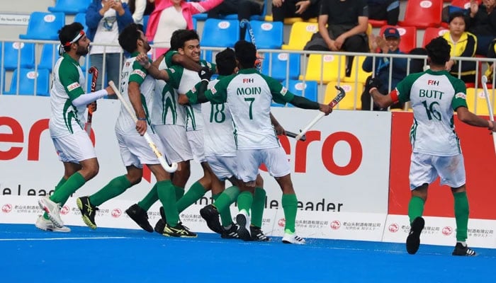 Pakistan mens hockey team celebrate at a match. - Asian Hockey Federation/Facebook