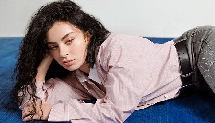 Charli XCX unveils remix album featuring Troye Sivan, Lorde, and Billie Eilish.