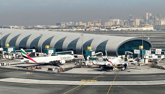 Emirates planes are seen on the tarmac in a general view of Dubai International Airport in Dubai, United Arab Emirates January 13, 2021. — Reuters