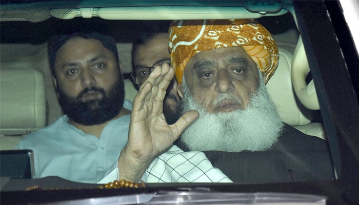 Jamiat Ulema-e-Islam-Fazl (JUI-F) chief Maulana Fazlur Rehman leaving his residence for attending National Assembly session, in the federal capital. — Online