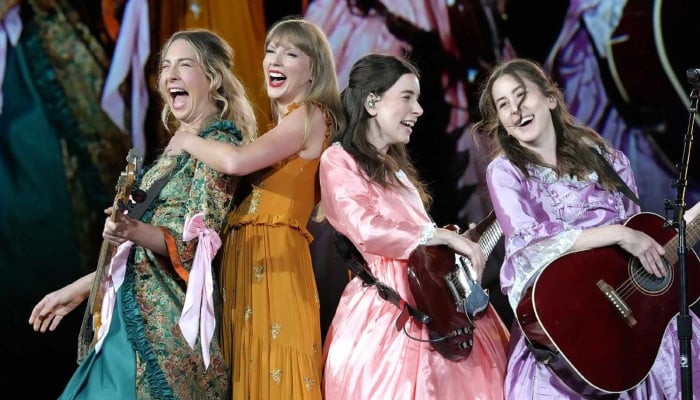 Este Haim details personal and professional experience with Taylor Swift