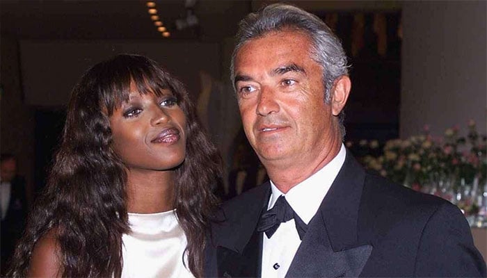 Naomi Campbell and Flavio Briatore share reunion at F1 event.