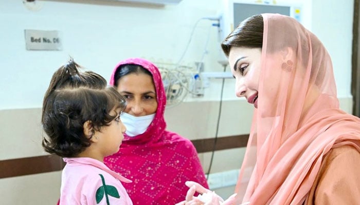 Punjab Chief Minister Maryam Nawaz Sharif interacts with a little girl during her visit to Lahores Childrens Hospital Cardiac Surgery Ward. — Supplied