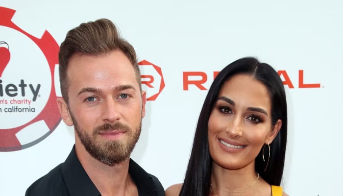 Artem Chigvintsev and Nikki Garcia amid divorce