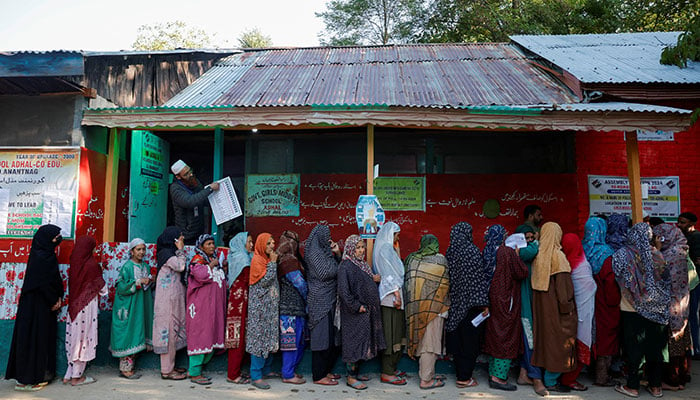 Kashmiri women queue to vote at a polling station, during the first phase of assembly election, in south Kashmirs Kokernag September 18, 2024. — Reuters