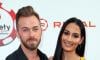 Artem Chigvintsev, Nikki Garcia ‘focused on co-parenting’ amid divorce