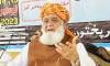 Fazl 'completely rejects' govt's constitutional package after meeting PTI top leaders