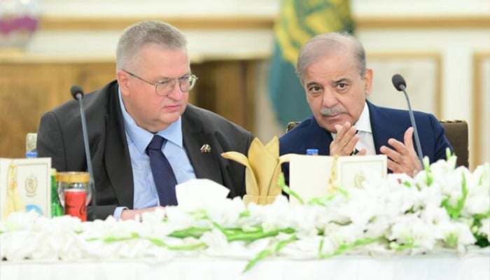 Deputy Prime Minister of Russian Federation Alexei Overchuk (left) and PM Shehbaz Sharif gesture during a meeting at PM Office on September 19, 2024. — APP