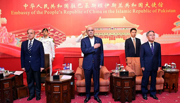 (From left to right) Prime Minister Shehbaz Sharif, President Asif Ali Zardari and Chinese ambassador to Pakistan Jiang Zaidong at ceremony in connection with the 75th anniversary of the founding of the People’s Republic of China on September 19, 2024. — PID