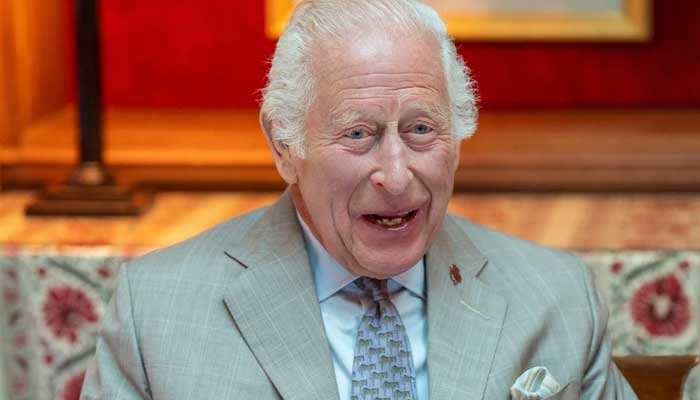 King Charles laughs off abdication rumours