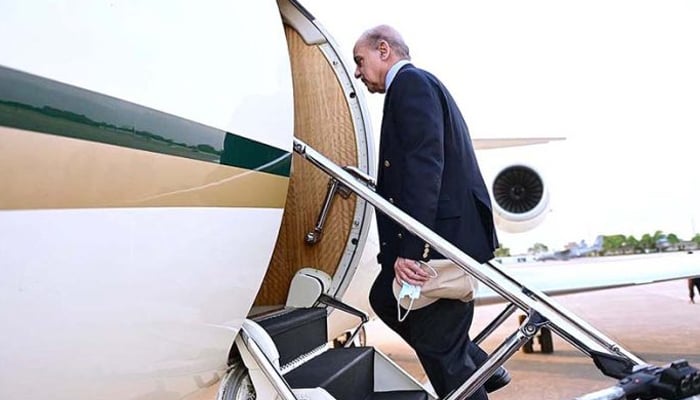 PM Shehbaz Sharif boarding a PAF plane as he leaves for Turkey. — Twitter/@PakPMO/File