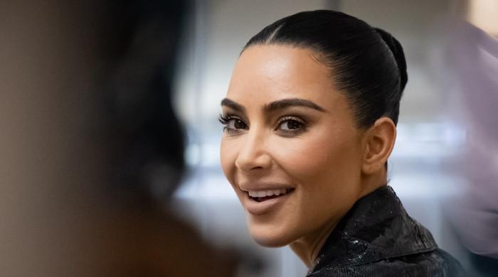 Kim Kardashian shares backache remedy with jaw-dropping selfies